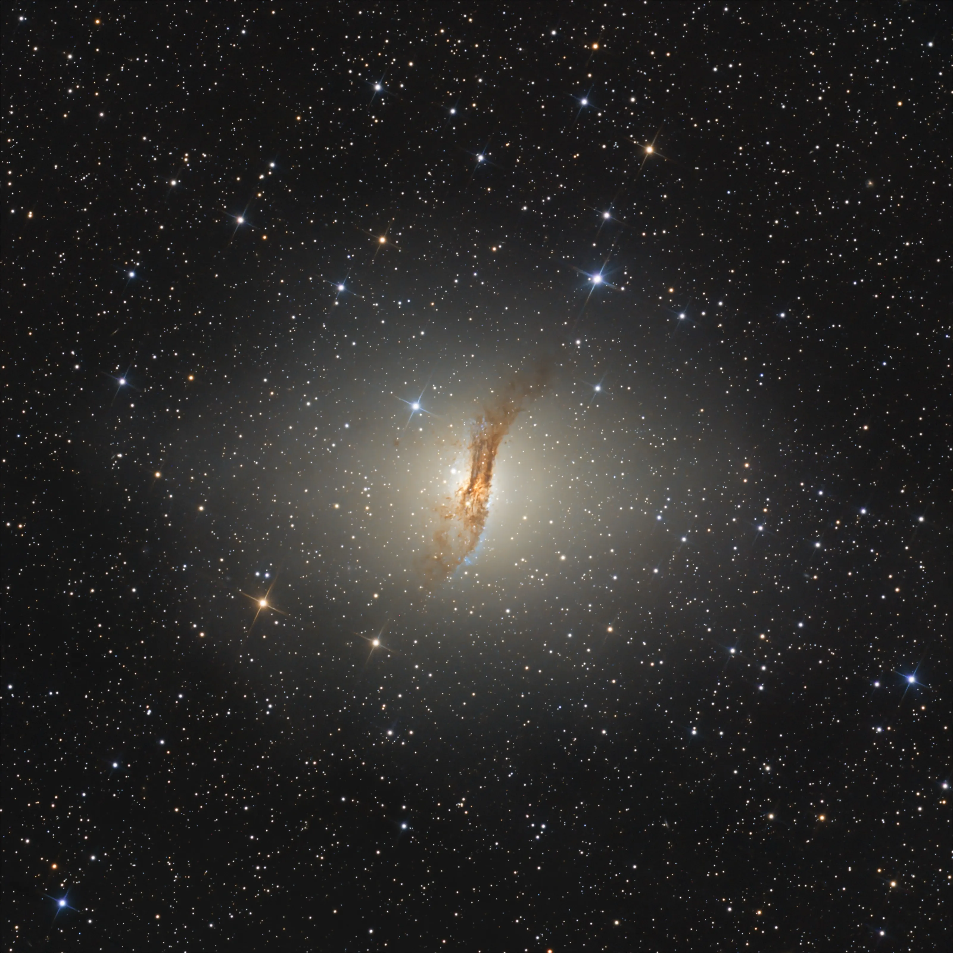 Centaurus A: an elliptical glow crossed by a dark dust lane
